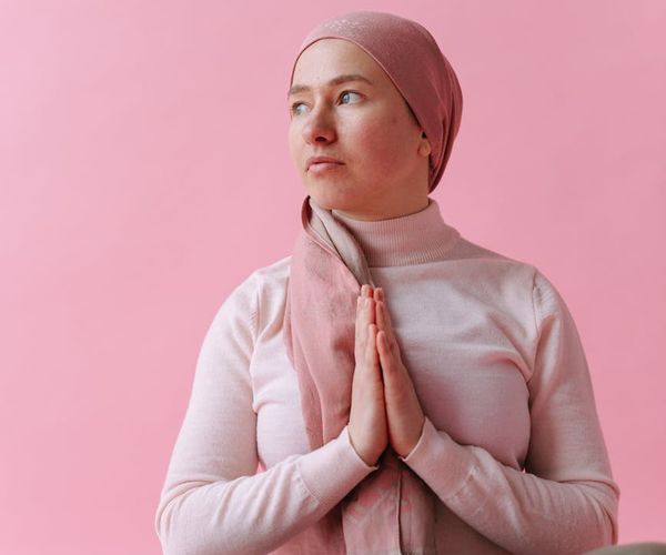 Woman sitting peacefully after yoga practice